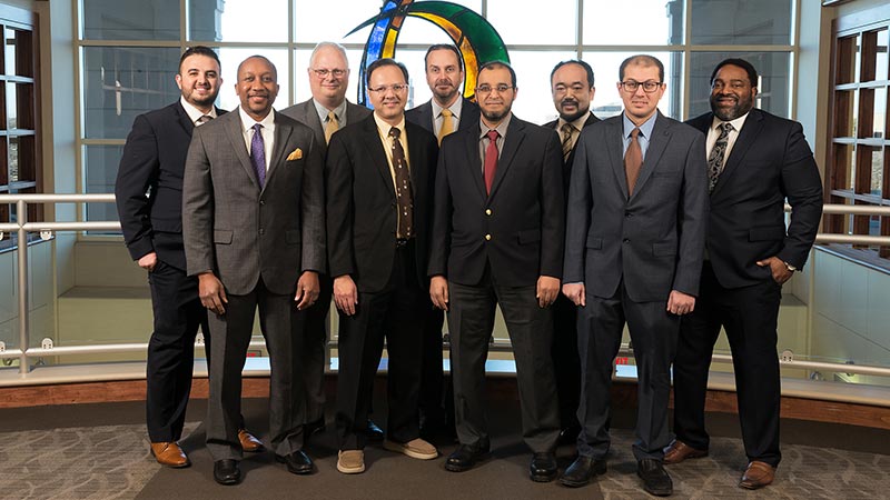 Surgery M.D.'s group photo includes Drs. Laswi, Obokhare, Schneider, Nazim, Hansen, Soliman, Hashimoto, Elfedaly, and Quigley
