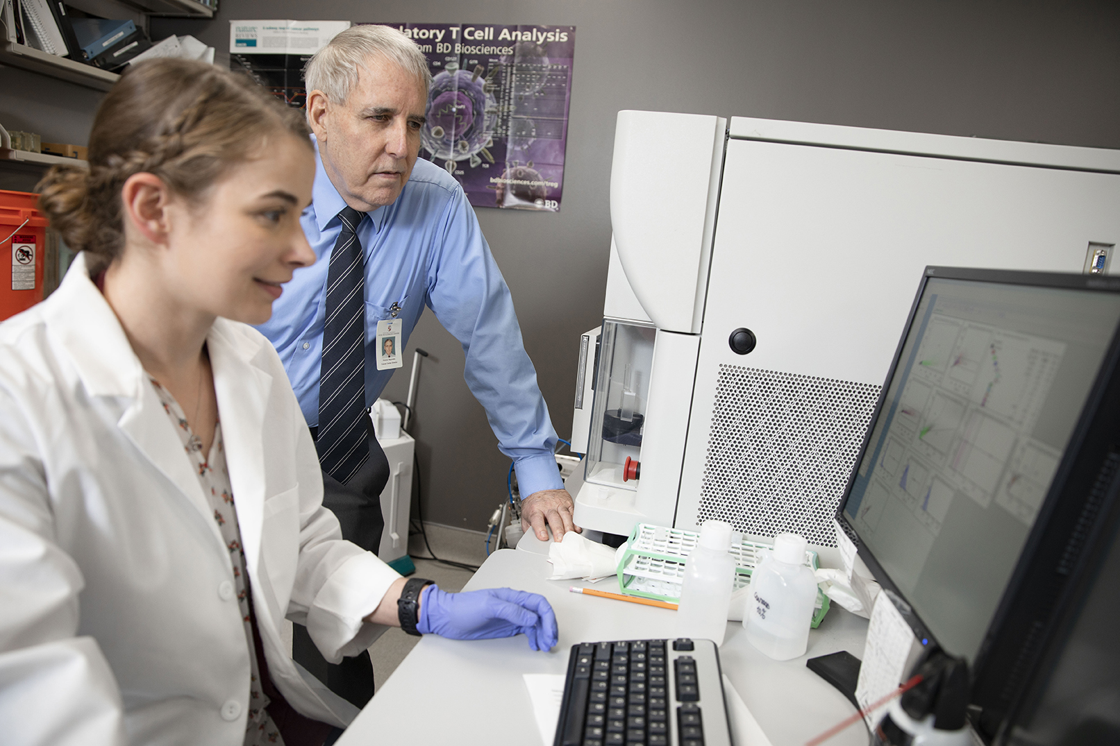Dr. Reynolds and researcher view data