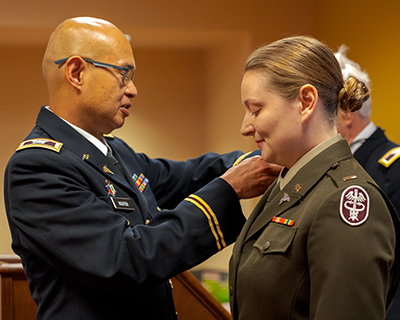 			      School of Medicine Graduates Honored at  Military Commissioning and Promotion Ceremony			   