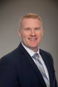 Adam McKee headshot